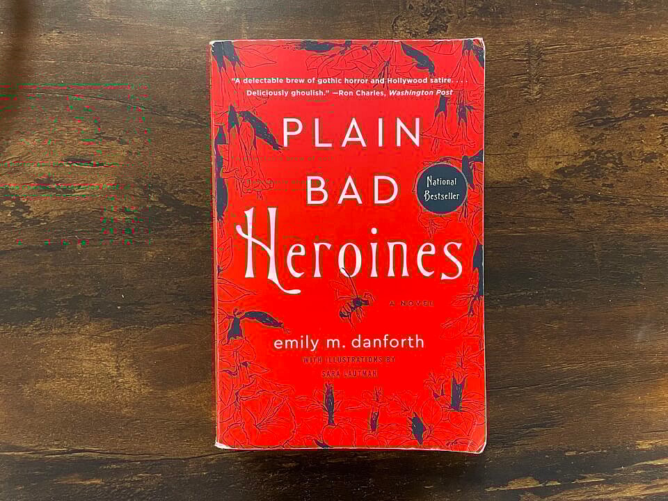 A paperback copy of Plain Bad Heroines by Emily M. Danforth