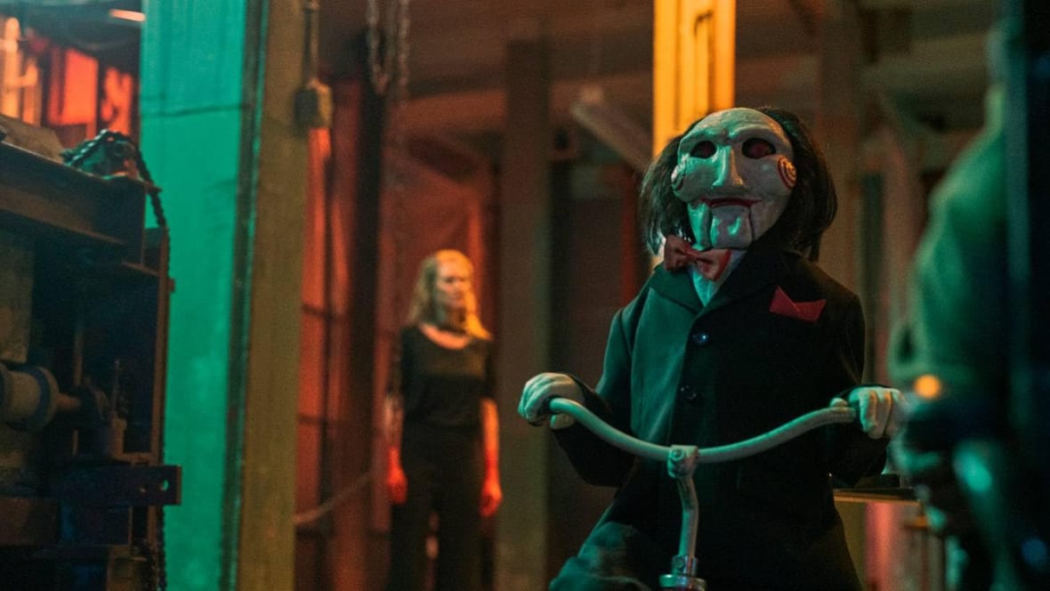 Billy the Puppet in Saw X Billy the Puppet and Cecilia Pederson in Saw X