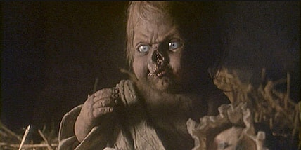 Baby Crypt Keeper cooing in Tales from the Crypt's "Lower Berth"