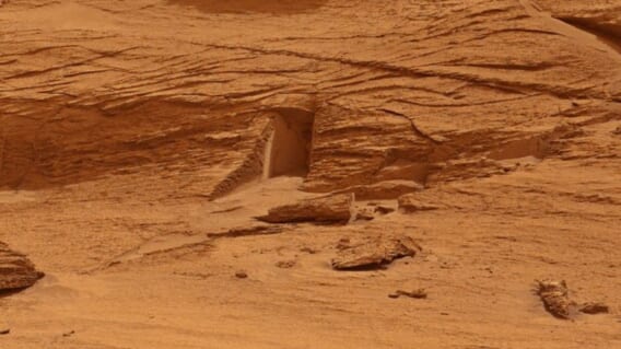 A photograph taken by a NASA rover shows a door like opening on Mars 568x319 - Home