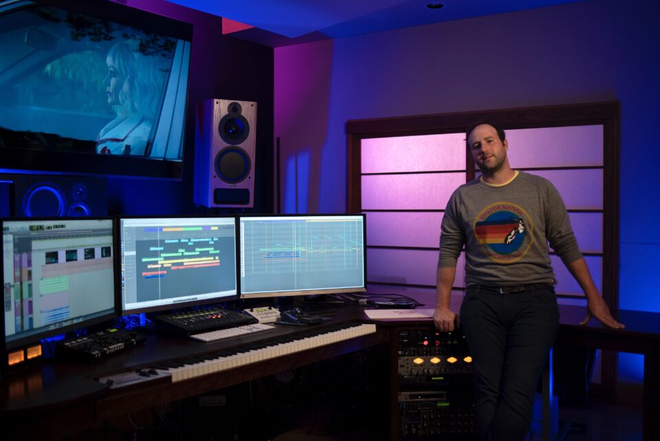 Composer Anthony Willis stands in his recording studio.