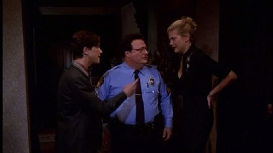 A still from 3rd Rock from the Sun featuring Joseph Gordon-Levitt, Wayne Knight and Kristen Johnston standing in a dark hallway 