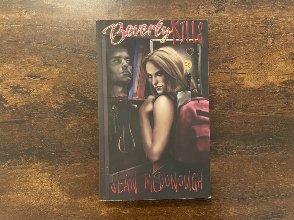 A paperback copy of Beverly Kills by Sean McDonough