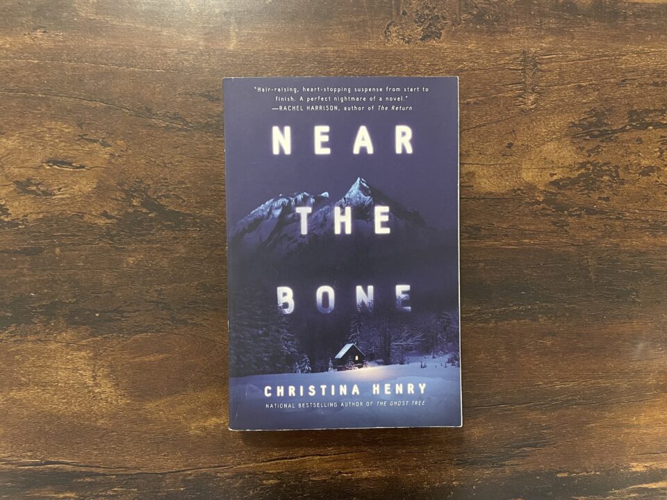 A paperback copy of Near the Bone by Christina Henry