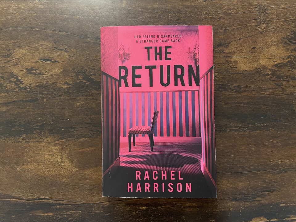 A paperback copy of The Return by Rachel Harrison