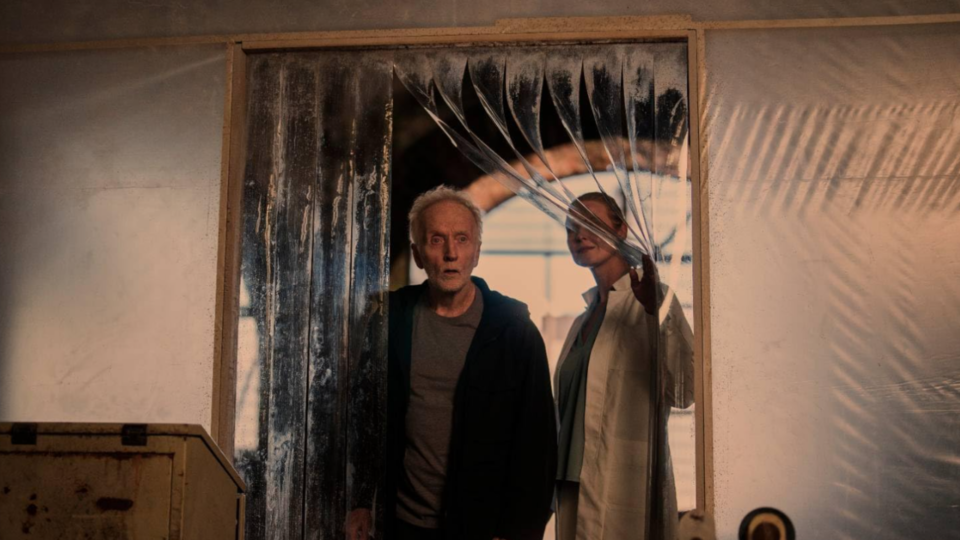 Tobin Bell as John Kramer and Synnøve Macody Lund as Cecilia Pederson in Saw X