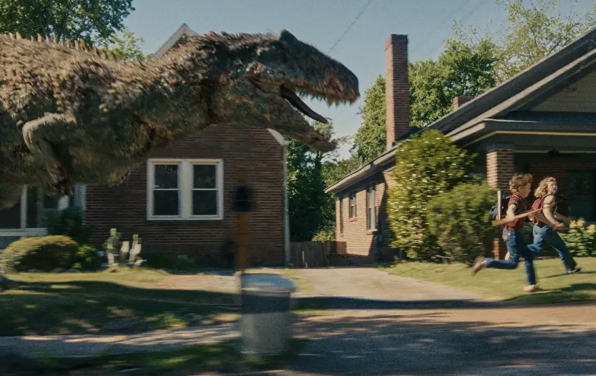 A Dinosaur Stalks the Suburbs in New ‘The End of Oak Street’ Image