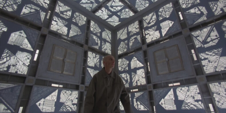 Alderson lost in white Cube room in Cube (1997).