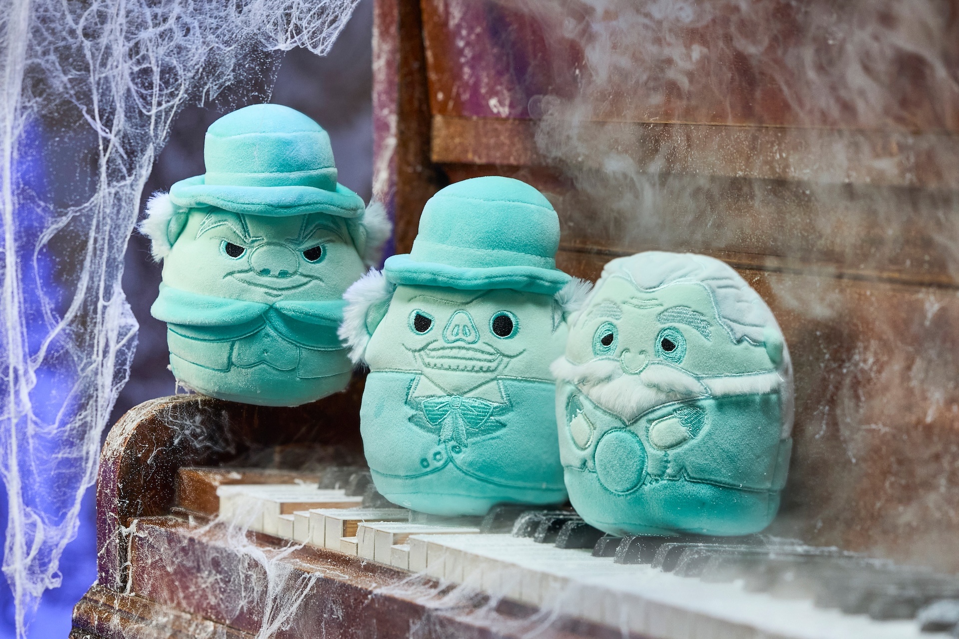 Materialize Your Wallet: Disney’s New ‘Haunted Mansion’ Collection Has Ghostly Gear, Loungeflys, and Light-Up Decor
